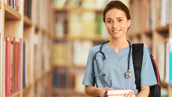Healthcare professional in library setting